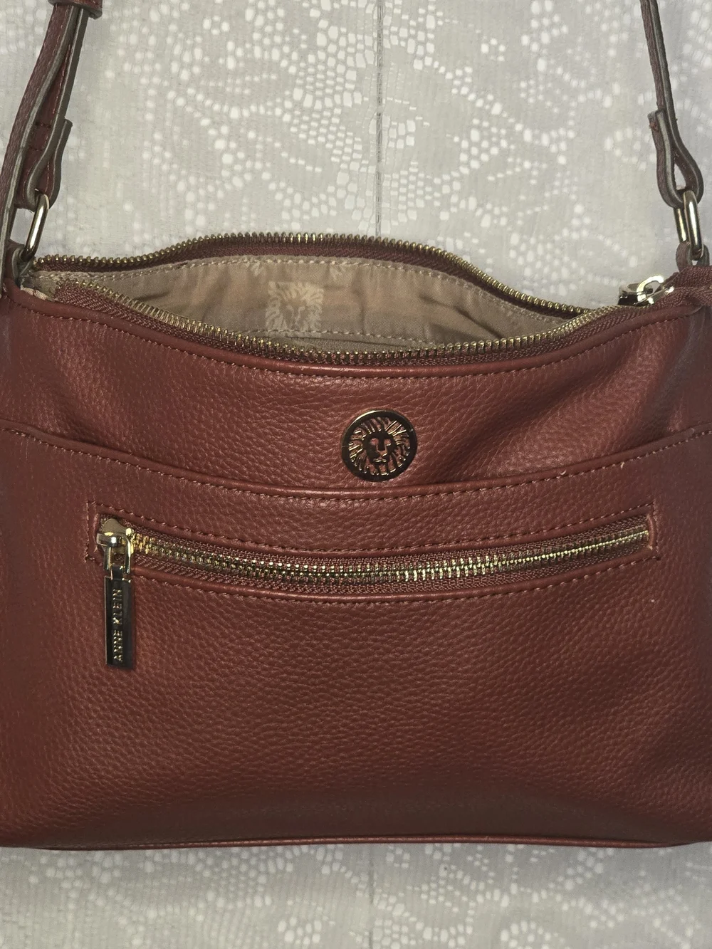 Anne Klein Cognac Brown Pebbled Faux Leather Crossbody Purse with Lion Logo